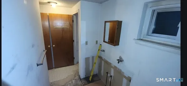 a view of a hallway with entryway