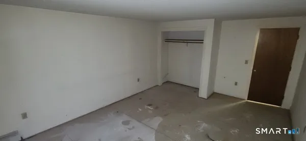 an empty room with a door