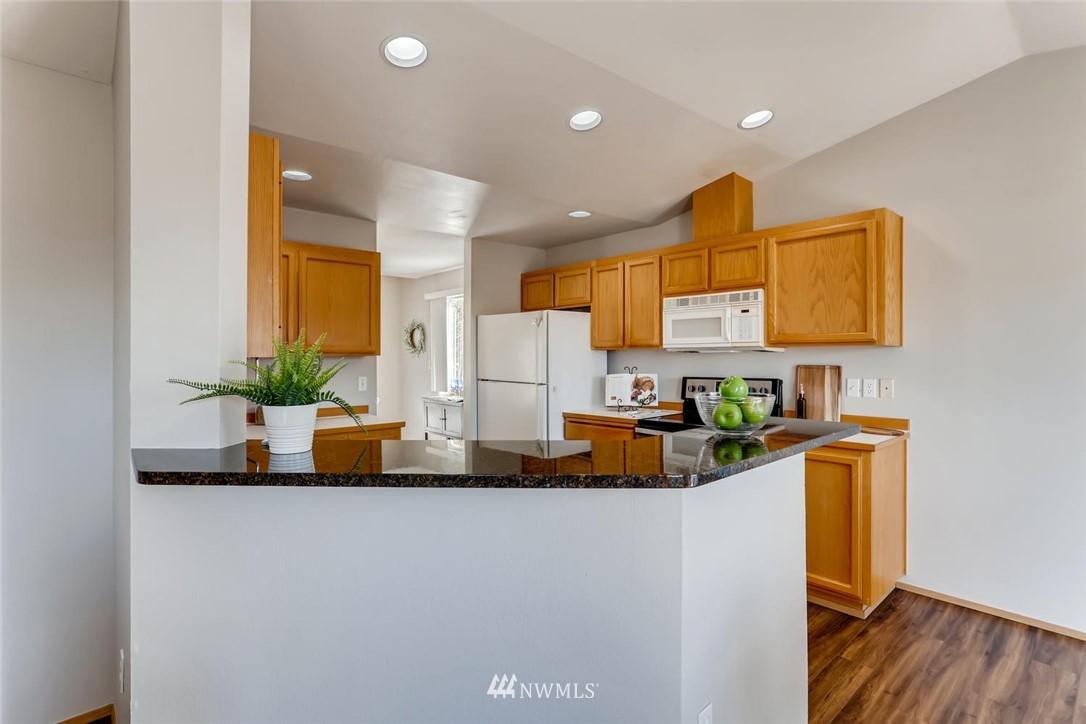 21022 25th Drive Southeast Bothell, WA 98021 - Photo 12 of 27 a kitchen with a sink a counter space and cabinets