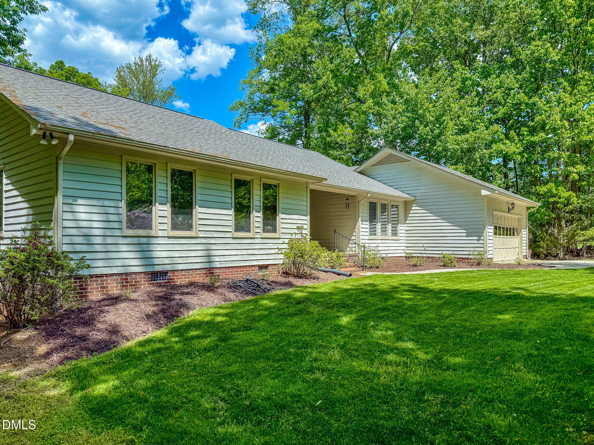 11 Denada Path Roxboro, NC 27574 - Photo 60 of 62 a view of a house with a backyard