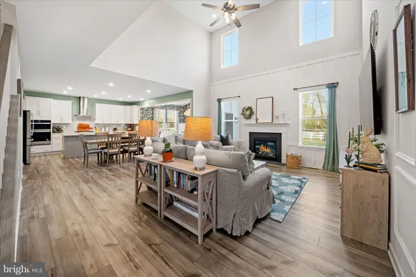 a living room with furniture fireplace and a flat screen tv