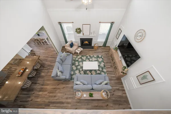 a bed room with a bed and a chair