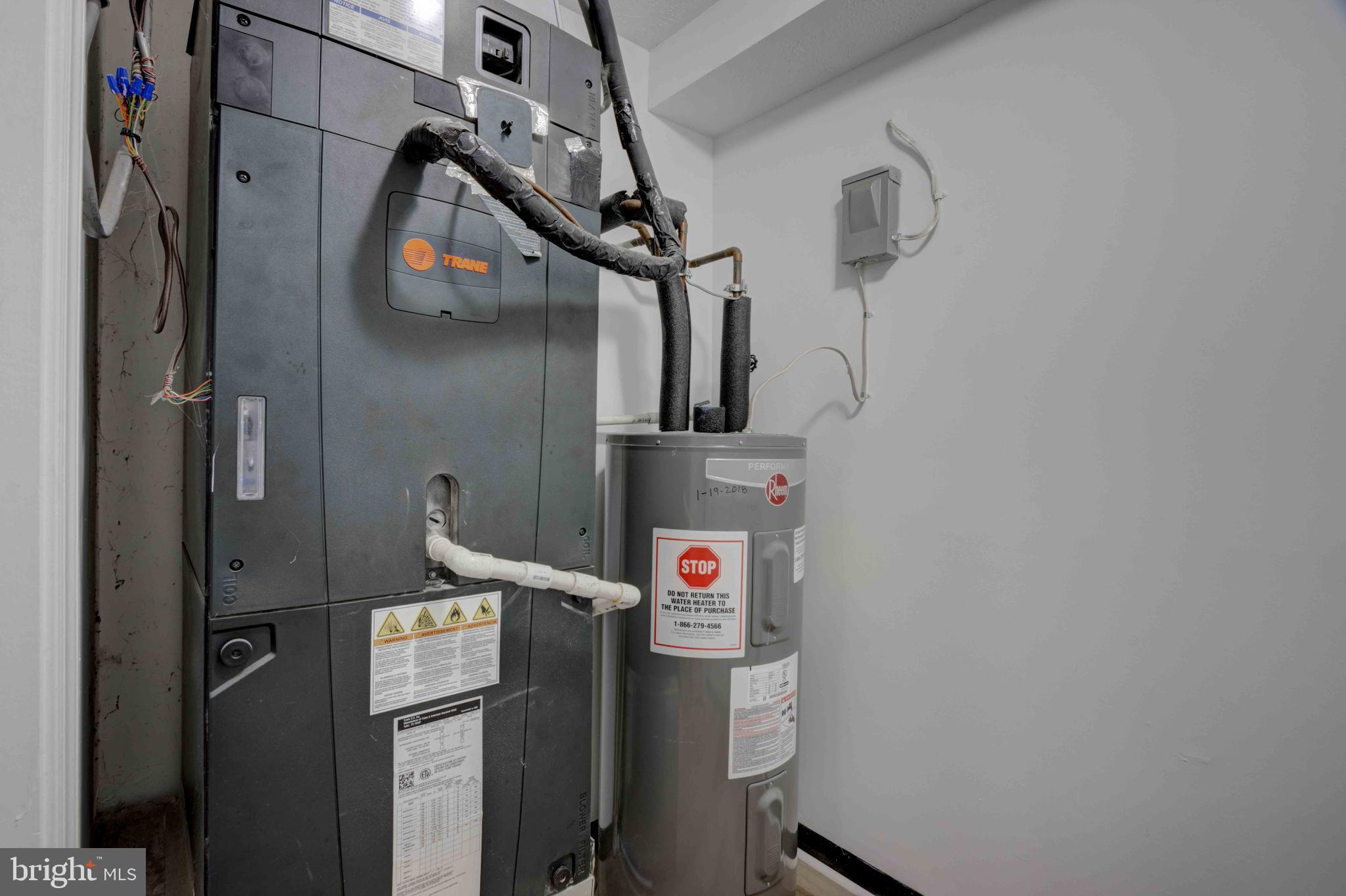 7903 Valley Manor Road, Unit 103 Owings Mills, MD 21117 - Photo 33 of 58 a utility room with dryer and washer