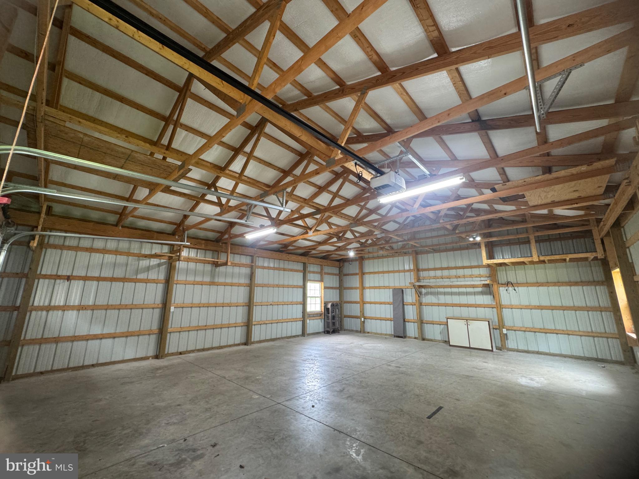 29756 Alexander Way Georgetown, DE 19947 - Photo 15 of 46 Spacious workshop with rustic charm.