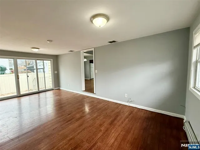 a kitchen with a refrigerator sink and stove
