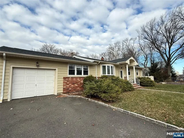 a front view of house with yard