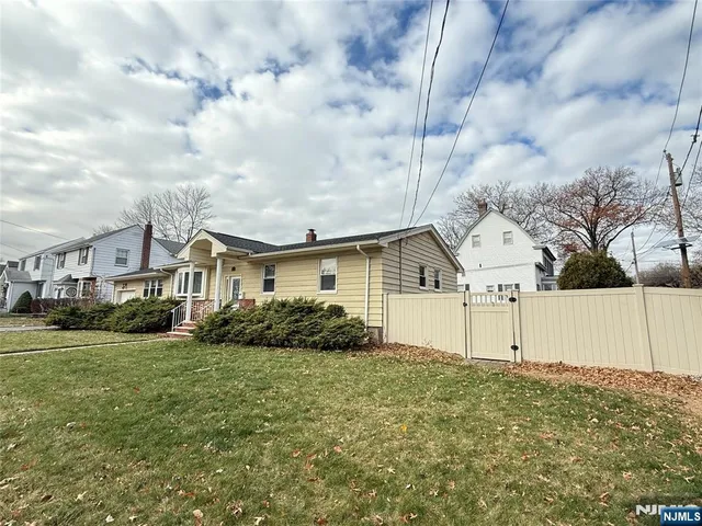 a park with bench and trees