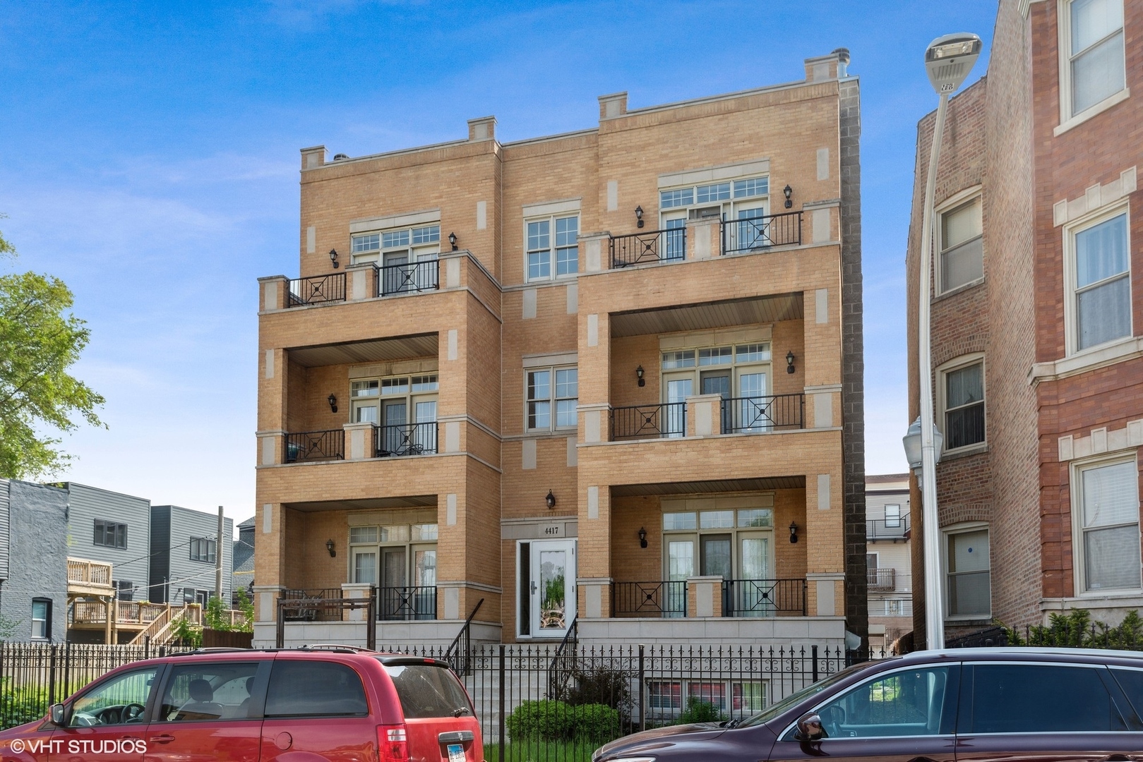 4417 South Calumet Avenue, Unit 2S Chicago, IL 60653 - Photo 1 of 16 a front view of building with yard