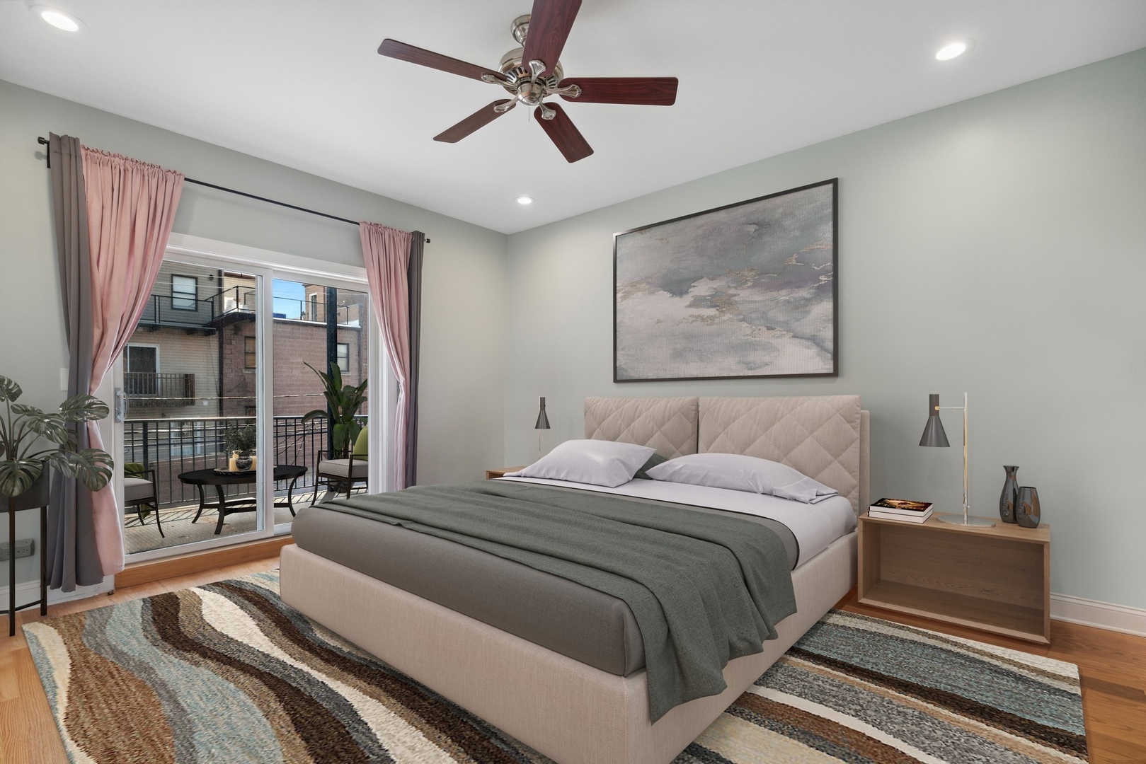 4417 South Calumet Avenue, Unit 2S Chicago, IL 60653 - Photo 9 of 16 a bedroom with a large bed and a chandelier