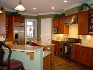 Undisclosed Address Sandwich, MA 02563 - Photo 4 of 8 a kitchen with stainless steel appliances granite countertop a sink a stove and a wooden floors