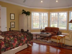 Undisclosed Address Sandwich, MA 02563 - Photo 6 of 8 a bedroom with a bed and a couch