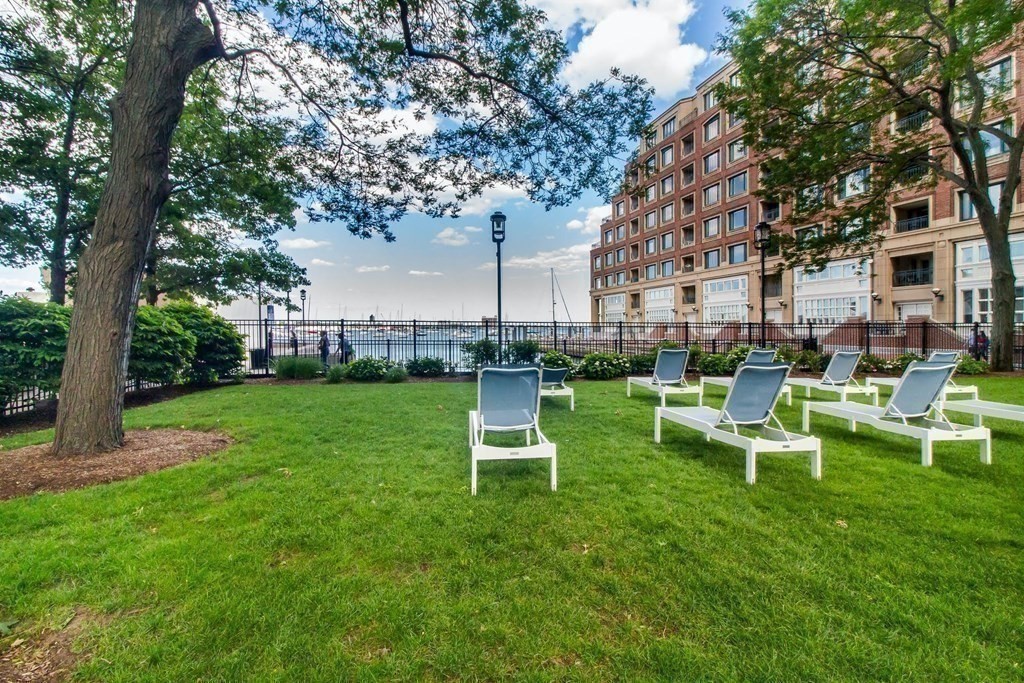 65 East India Row, Unit 22C Boston, MA 02110 - Photo 12 of 17 a view of a chair and table in the garden