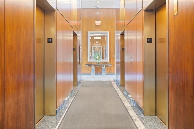a view of a hallway with windows
