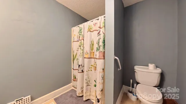 a bedroom with a bed and a closet