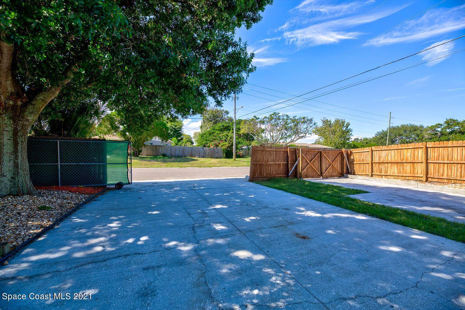 2648 Locksley Road Melbourne, FL 32935 - Photo 5 of 16 a view of backyard with outdoor space