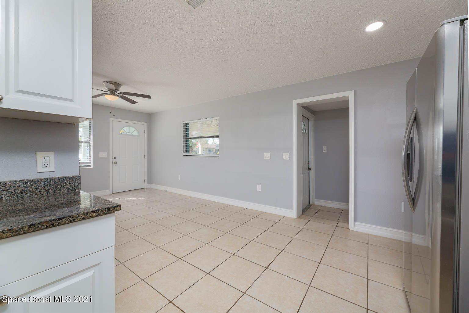2648 Locksley Road Melbourne, FL 32935 - Photo 10 of 16 a view of an empty room and window