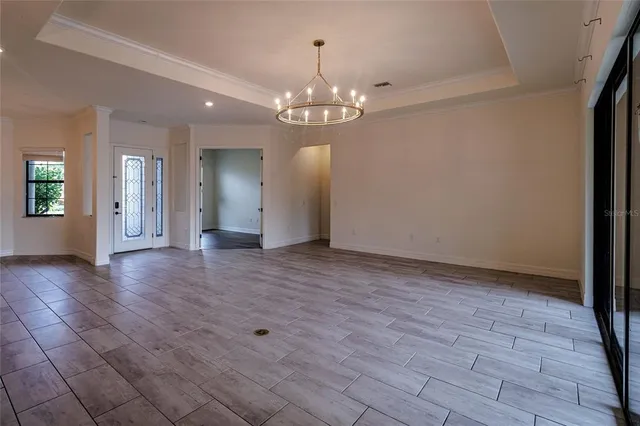 a view of swimming pool and floor to ceiling window