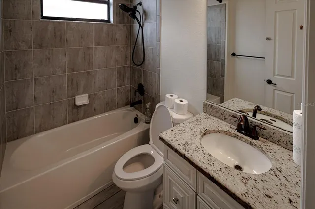 a view of a storage & utility room with a washer dryer