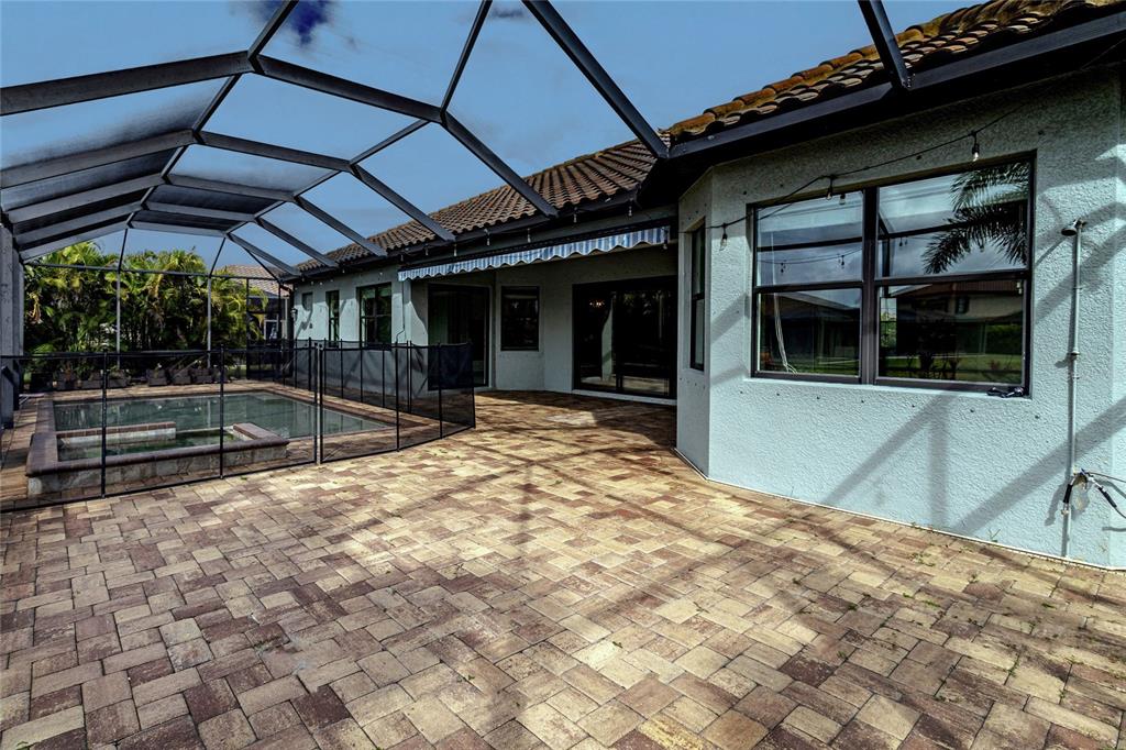 20315 Passagio Drive Venice, FL 34293 - Photo 22 of 40 a view of a backyard of a house