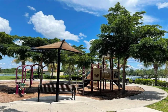 an aerial view of houses with yard