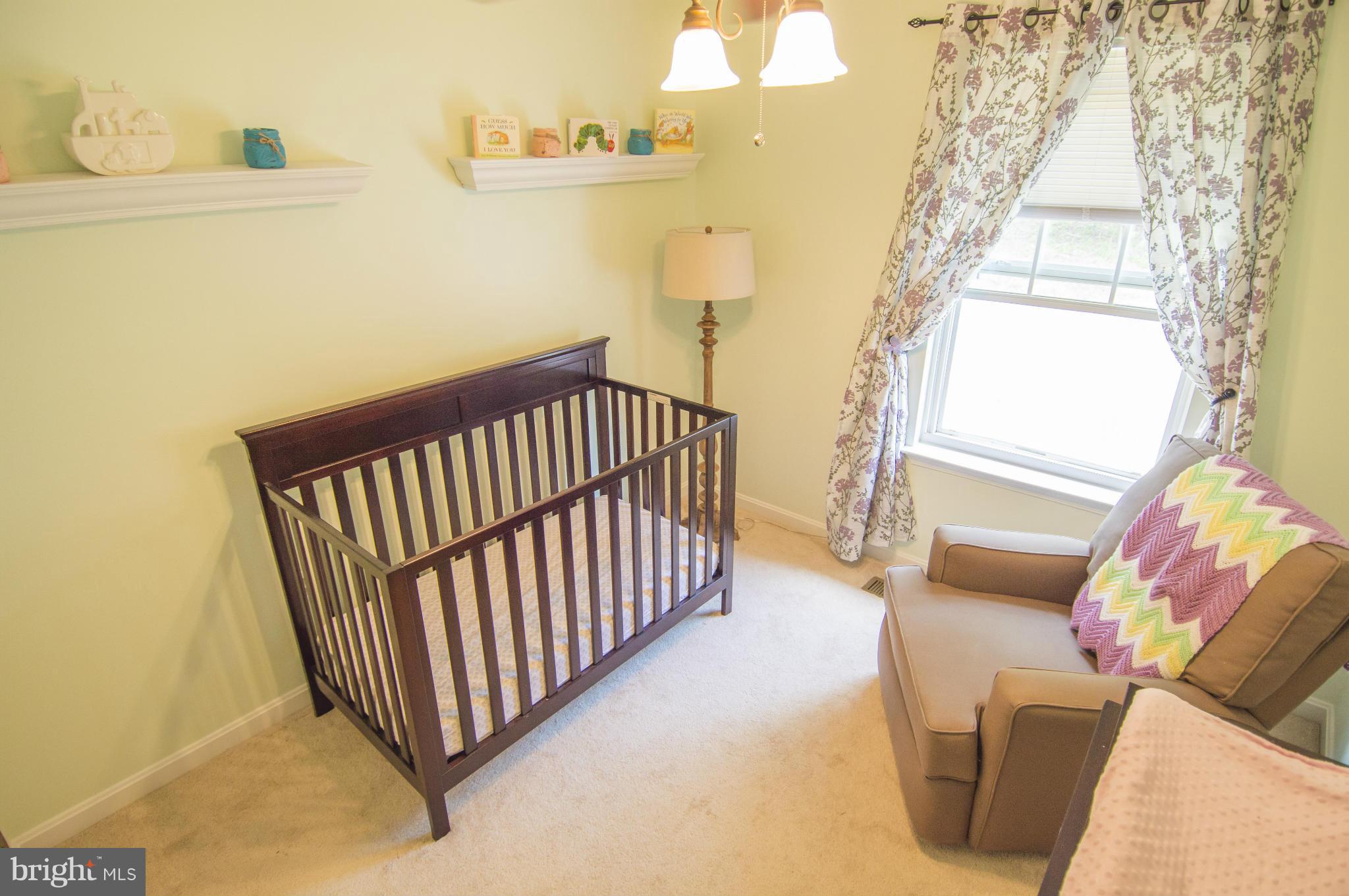 1055 Rimrock Road Lusby, MD 20657 - Photo 14 of 30 Spacious Upstairs Bedroom