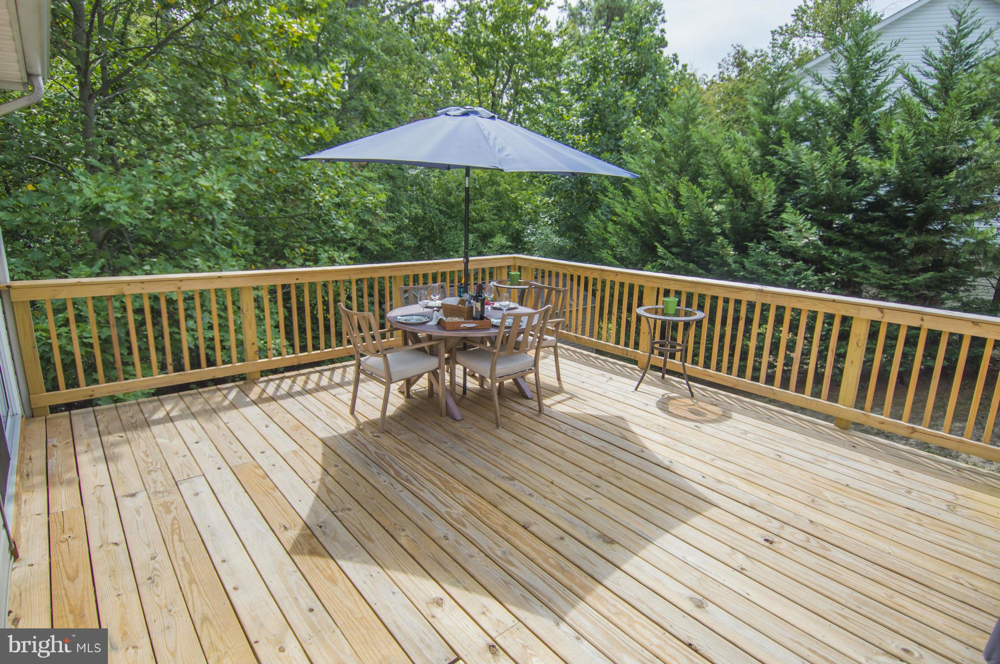 1055 Rimrock Road Lusby, MD 20657 - Photo 16 of 30 Large Deck with New Boards, Rails and Stairs