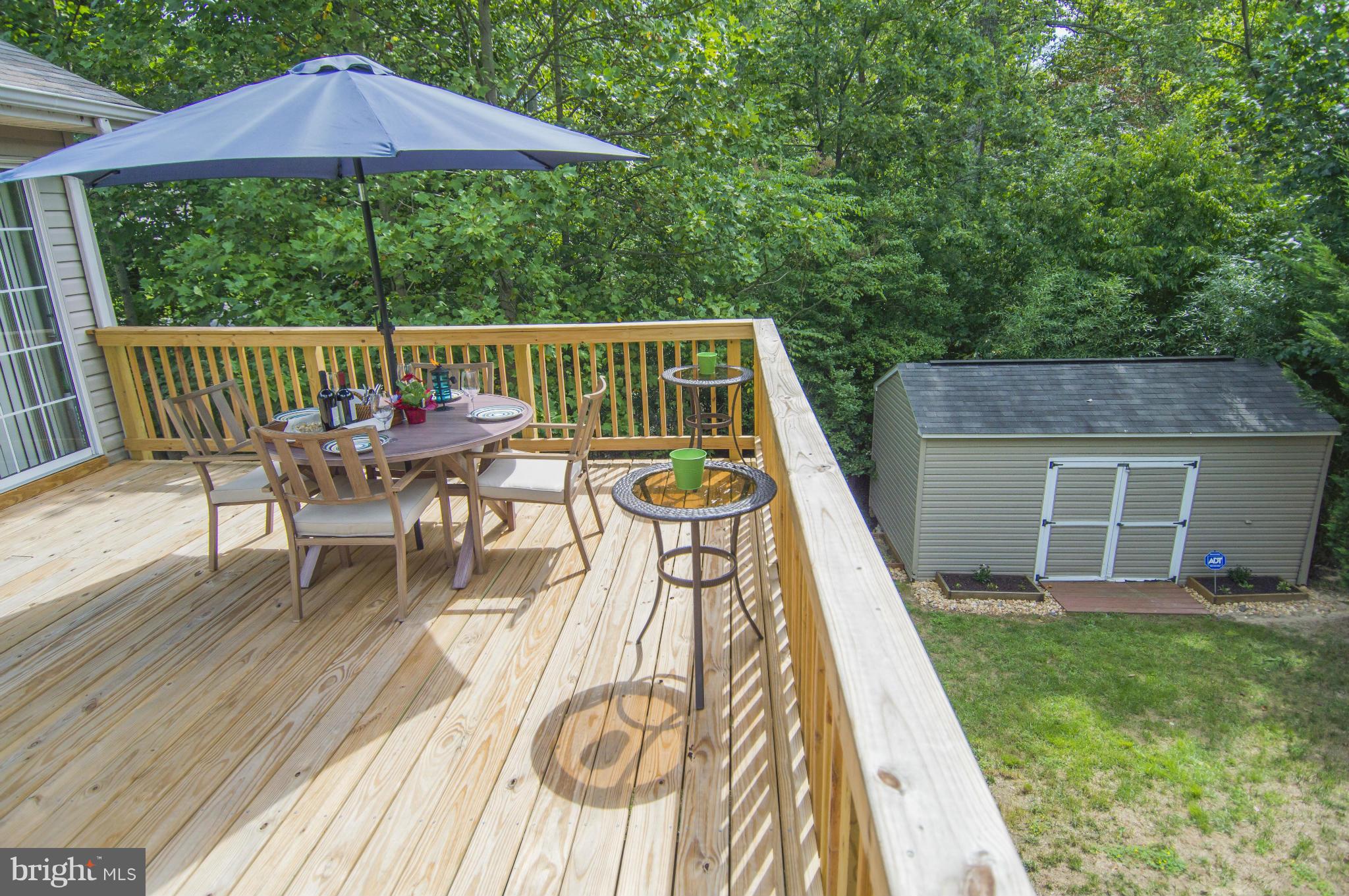1055 Rimrock Road Lusby, MD 20657 - Photo 17 of 30 Deck and Shed In Backyard