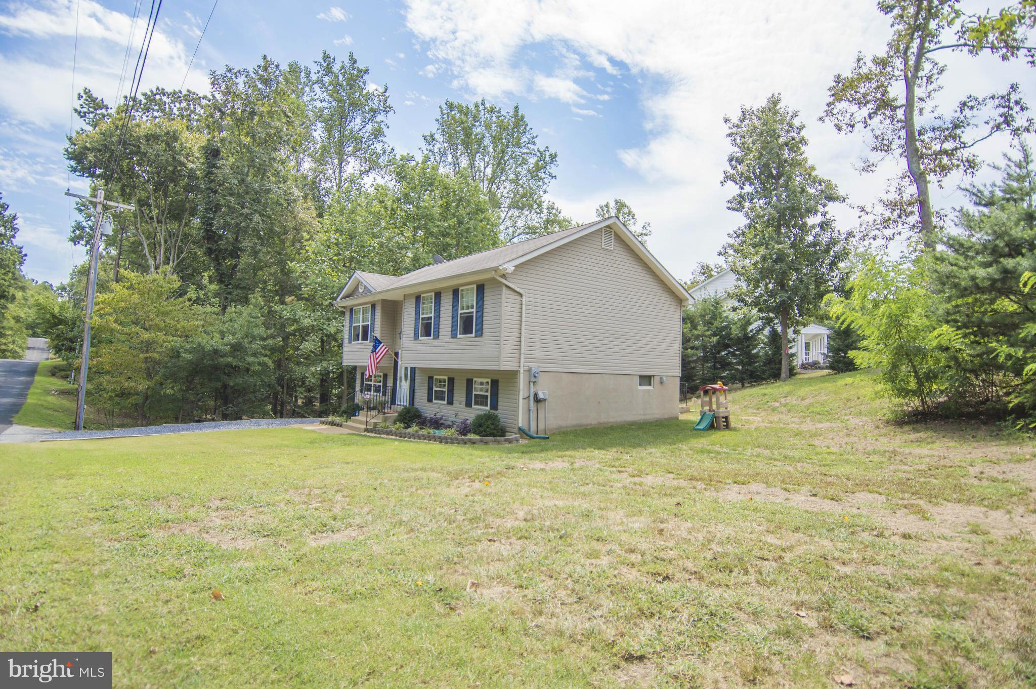 1055 Rimrock Road Lusby, MD 20657 - Photo 3 of 30 Large Side Yard