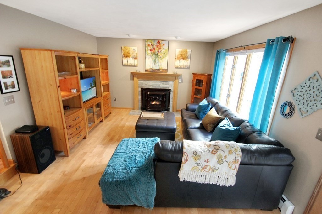 6 Patterson Road Shirley, MA 01464 - Photo 13 of 27 a living room with furniture and a fireplace