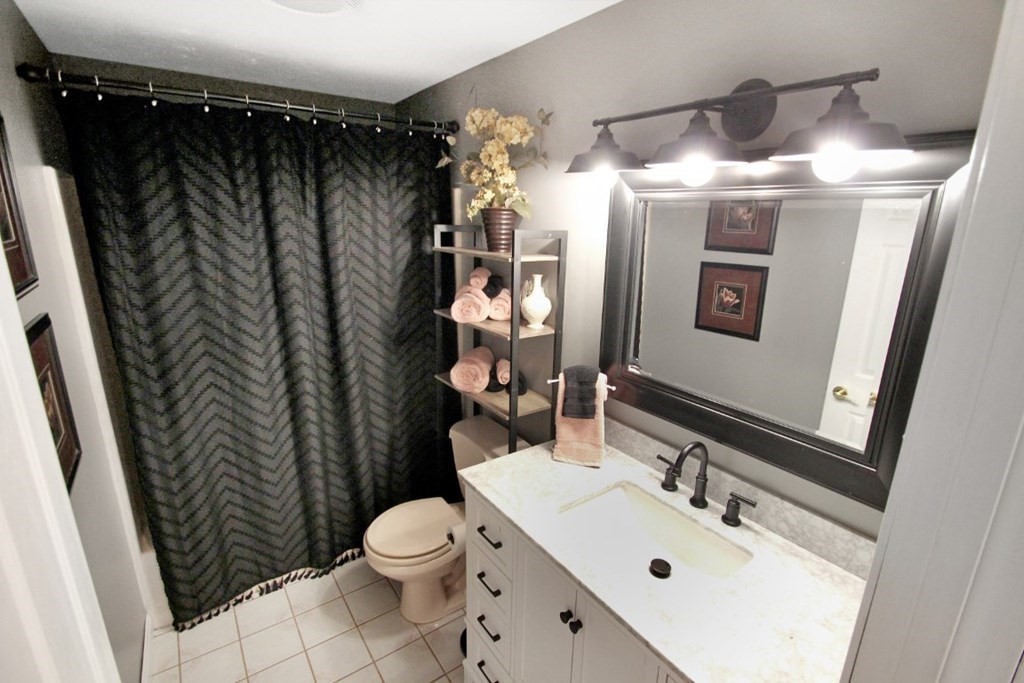 6 Patterson Road Shirley, MA 01464 - Photo 18 of 27 a bathroom with a sink toilet and shower