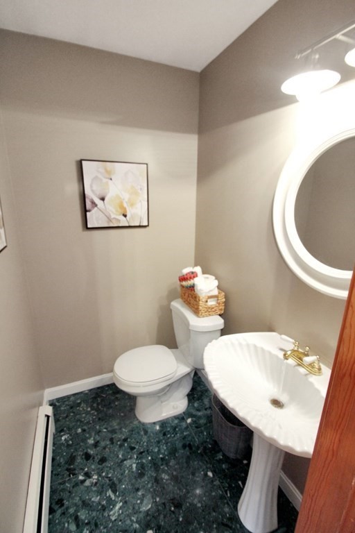 6 Patterson Road Shirley, MA 01464 - Photo 22 of 27 a bathroom with a toilet sink and mirror