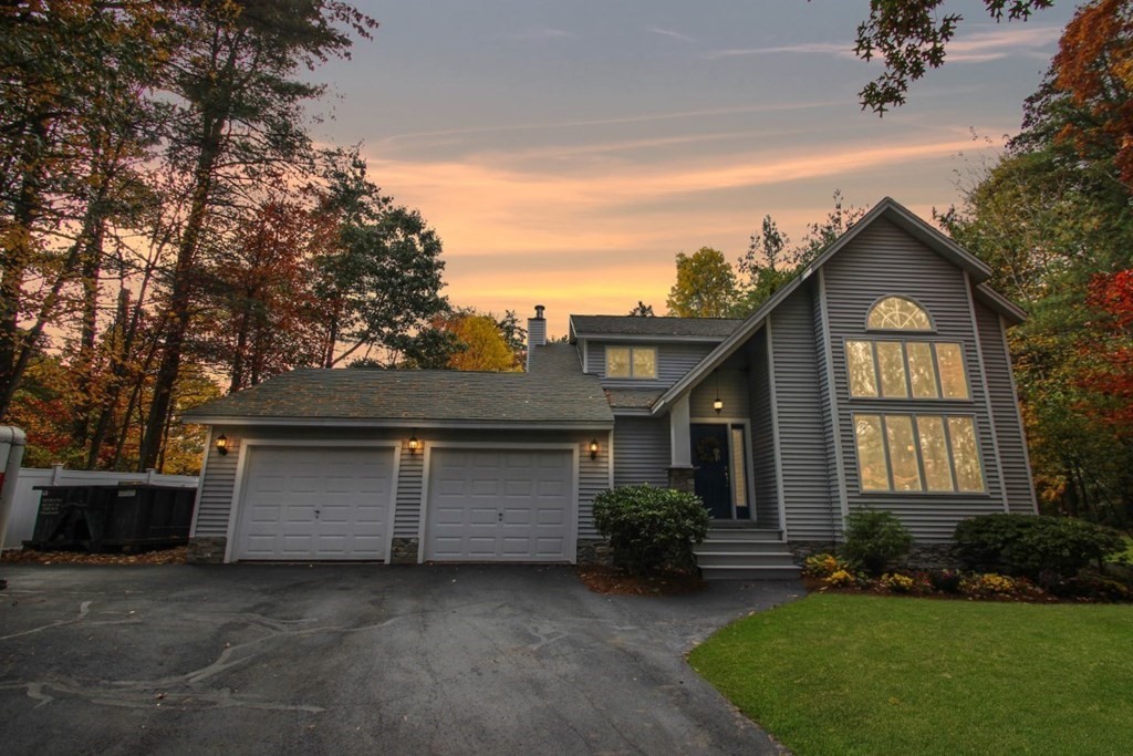 6 Patterson Road Shirley, MA 01464 - Photo 27 of 27 a front view of a house with a yard and garage
