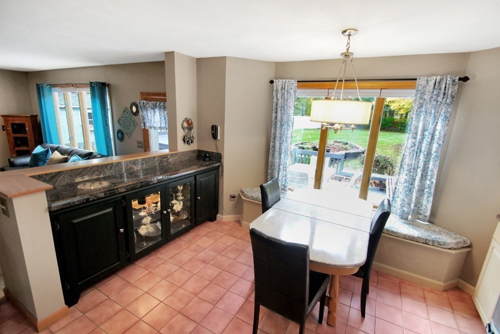 6 Patterson Road Shirley, MA 01464 - Photo 10 of 27 a view of a dining room with furniture and a window