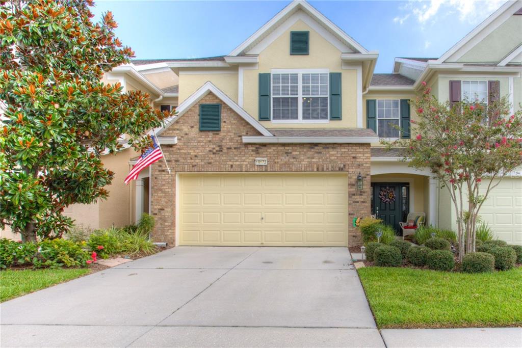 10172 Haverhill Ridge Drive Riverview, FL 33578 - Photo 1 of 1 a front view of a house with a yard and garage
