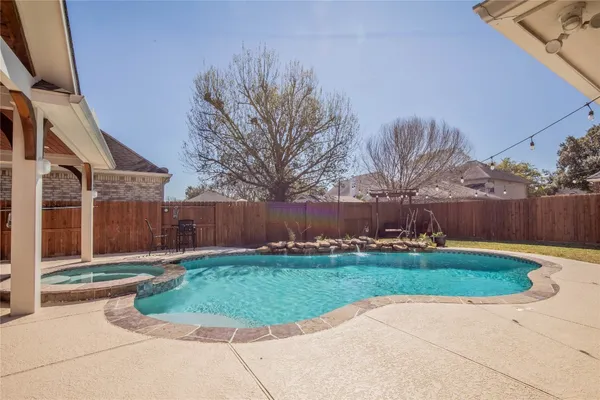 a view of backyard with green space