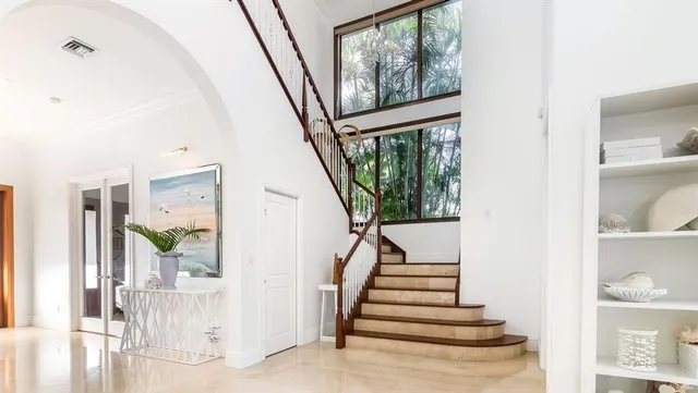 a hallway with view of living room