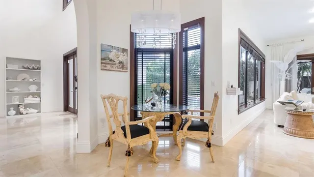 a view of a kitchen with wooden floor and cabinet