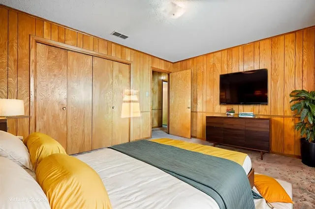 a view of a room with a wooden walls