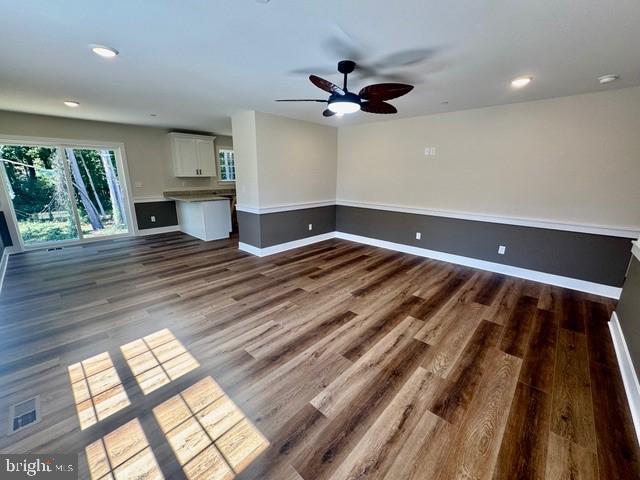 Harbor Drive Chester, MD 21619 - Photo 2 of 12 a view of empty room with wooden floor and fan
