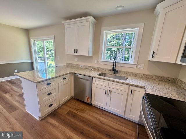 Harbor Drive Chester, MD 21619 - Photo 6 of 12 a kitchen with white cabinets window and sink