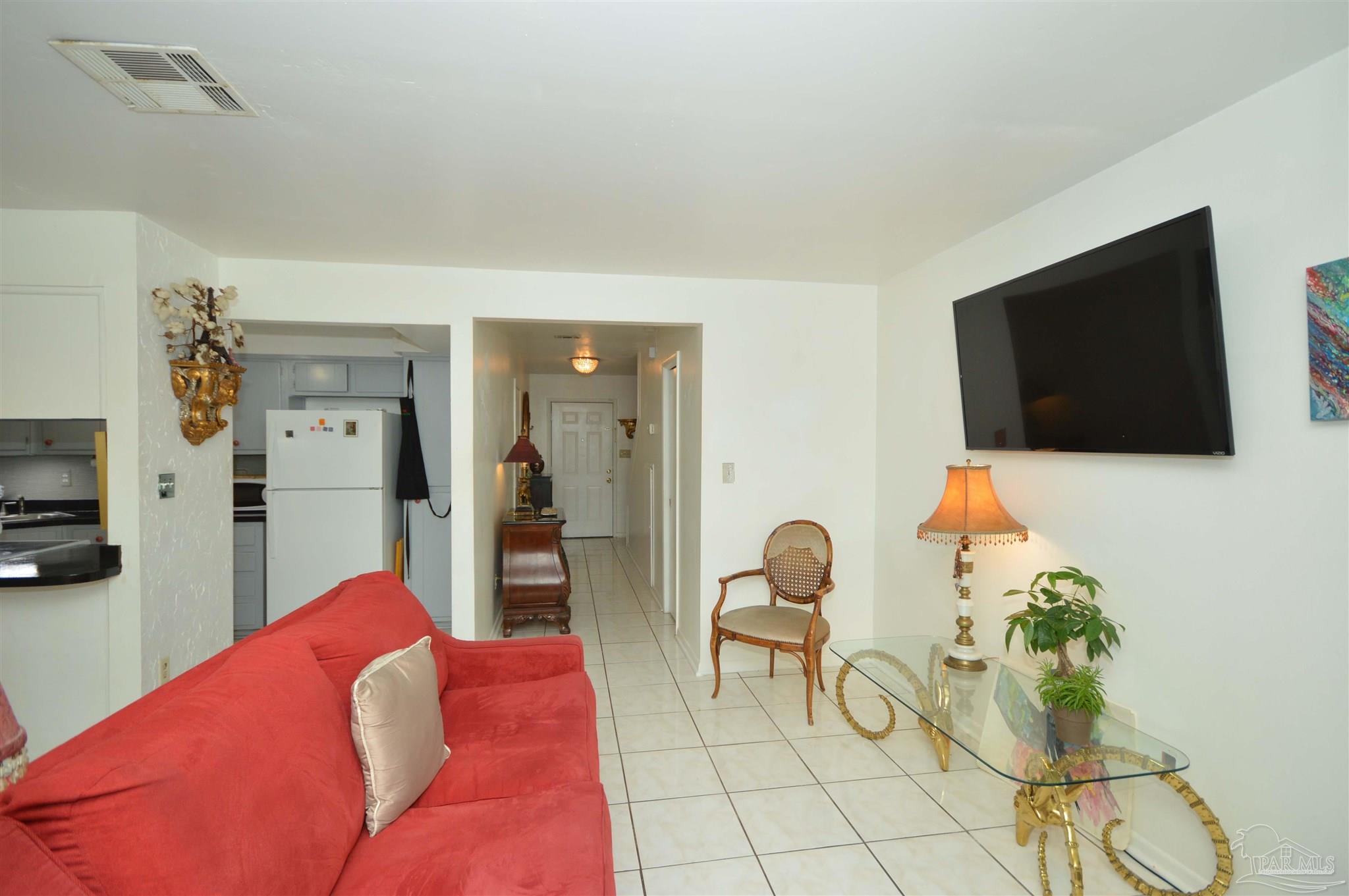6079 Hilburn Road Pensacola, FL 32504 - Photo 6 of 48 looking toward foyer; 1/2 bath on right