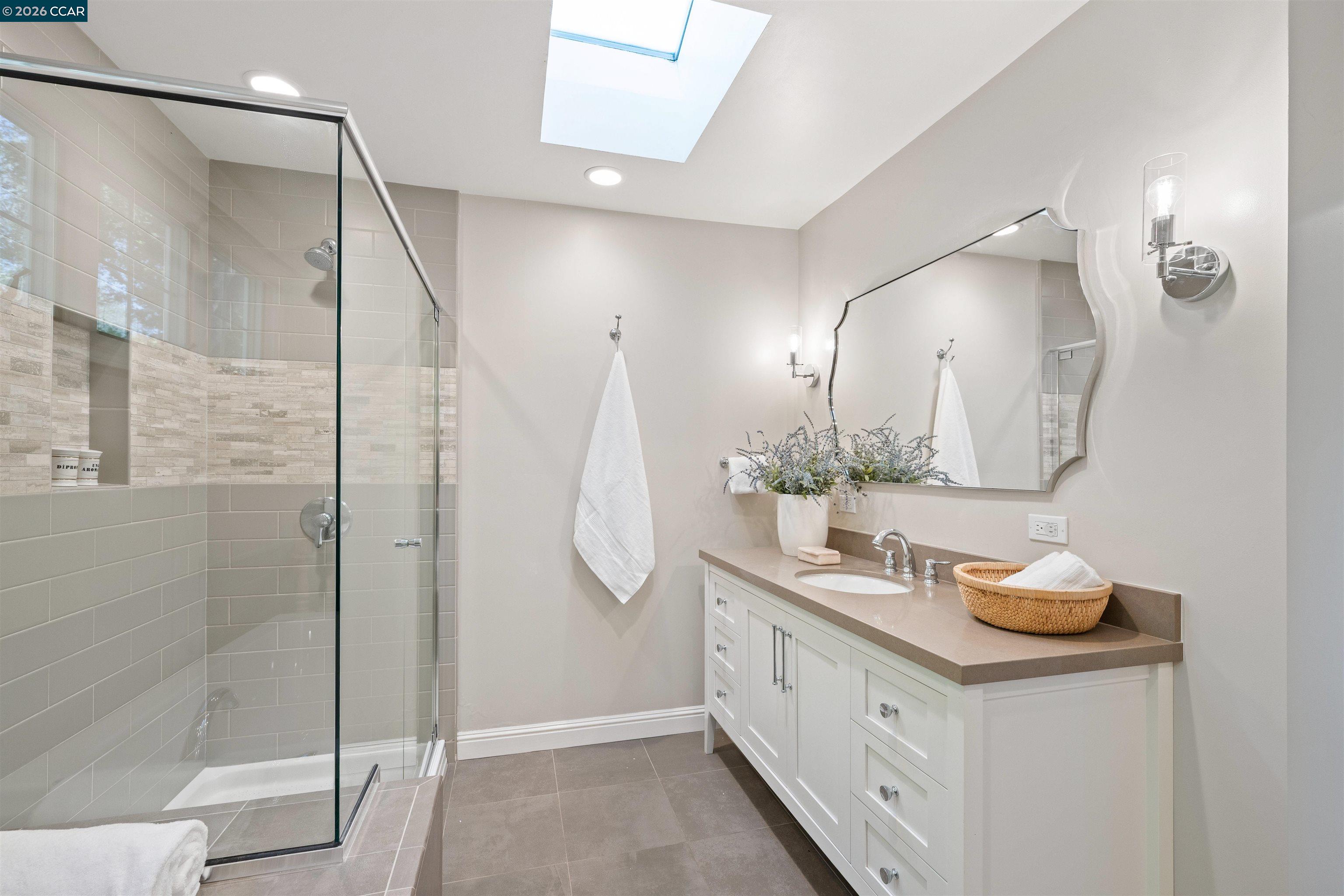 120 Las Vegas Road Orinda, CA 94563 - Photo 13 of 23 a bathroom with a double vanity sink mirror and shower