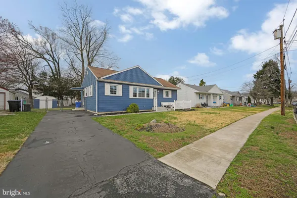a view of house with yard and entertaining space