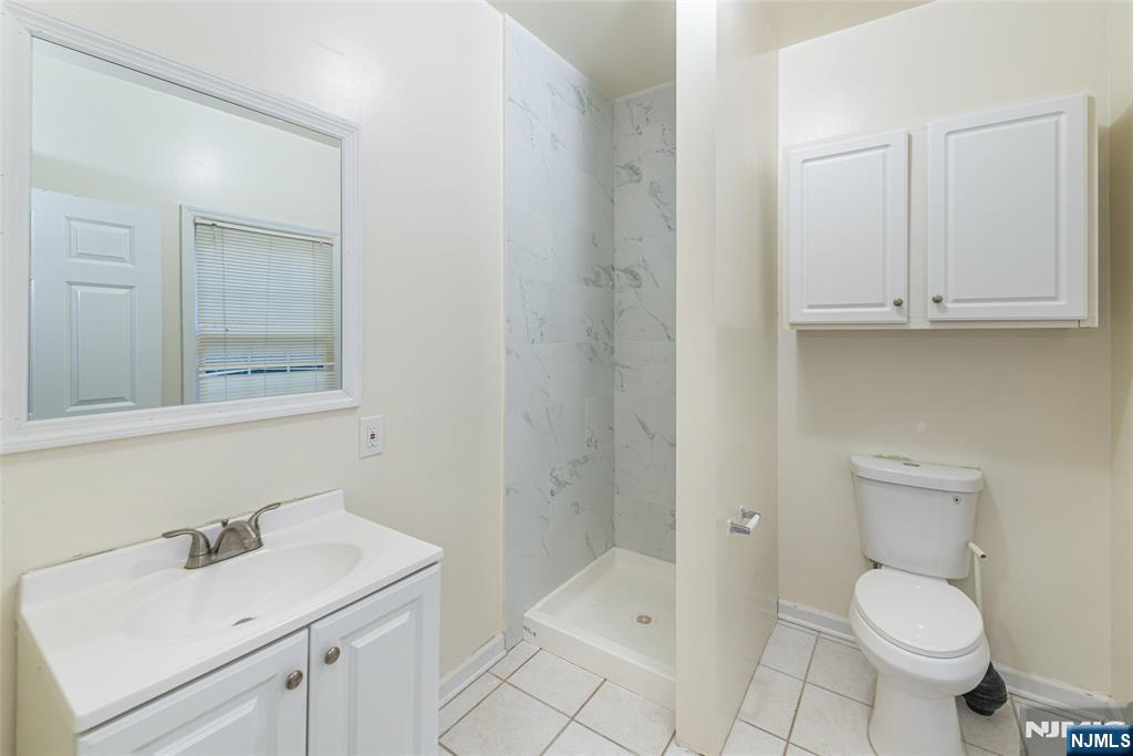 190 Andover Mohawk Road Andover, NJ 07821 - Photo 24 of 45 a bathroom with a sink toilet and vanity