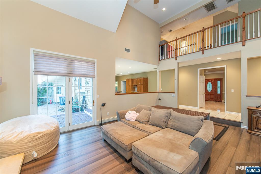 190 Andover Mohawk Road Andover, NJ 07821 - Photo 31 of 45 a living room with furniture and a large window