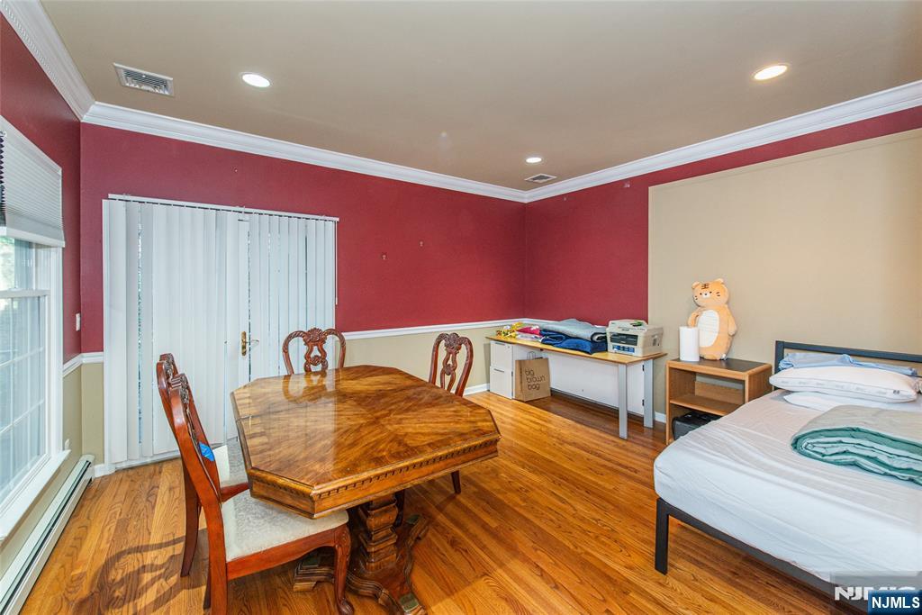 190 Andover Mohawk Road Andover, NJ 07821 - Photo 45 of 45 a dining room with furniture and wooden floor