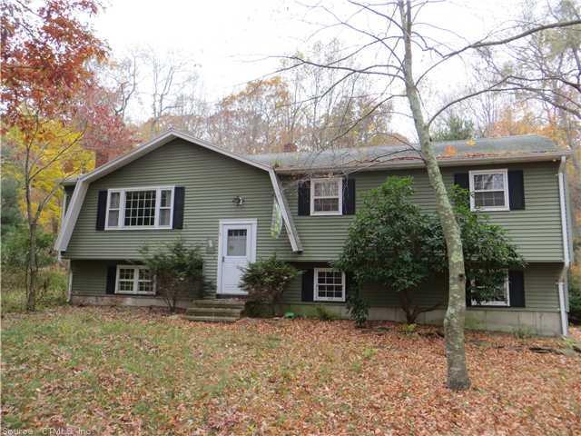 117 Ironworks Road Clinton, CT 06413 - Photo 1 of 1 front view of a house with a yard