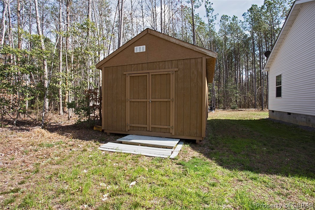 1496 Elsom Mascot Road Mattaponi, VA 23110 - Photo 29 of 33 a front view of a house with a yard