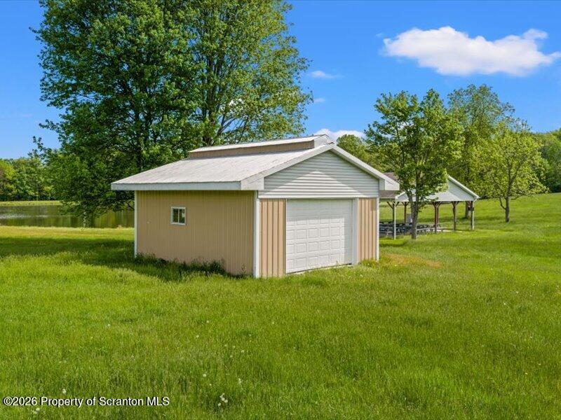 9-17 Vago Road Tunkhannock, PA 18657 - Photo 43 of 57 a view of a house with a yard