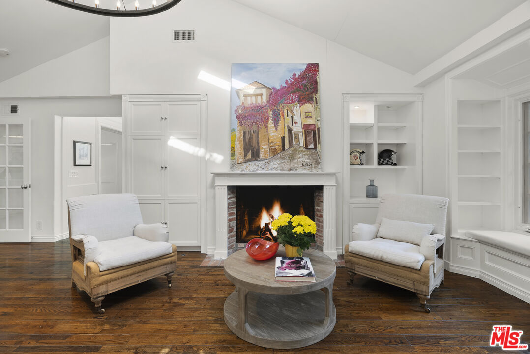 2761 Hutton Drive Beverly Hills, CA 90210 - Photo 11 of 29 a living room with furniture and a fireplace